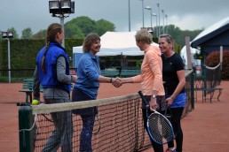 Halton tennis doubles players shaking hands